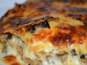 One of Joann's friends can't eat onions, garlic, red wine, or tomatoes, all of which are in her recipe for Moussaka!